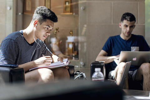 Students studying in lobby.