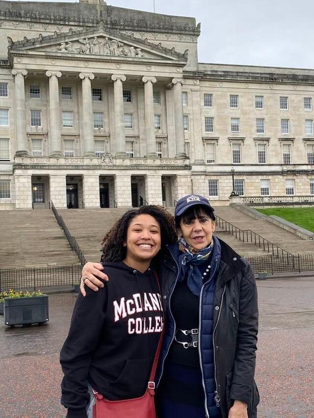 A student with a teacher standing together in Ireland 