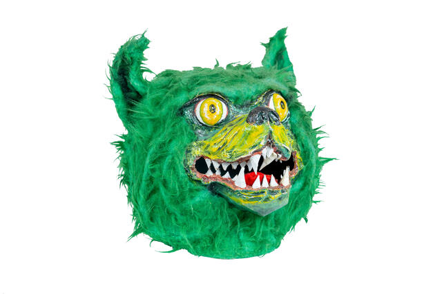 The head of the 90s Green Terror mascot suit.