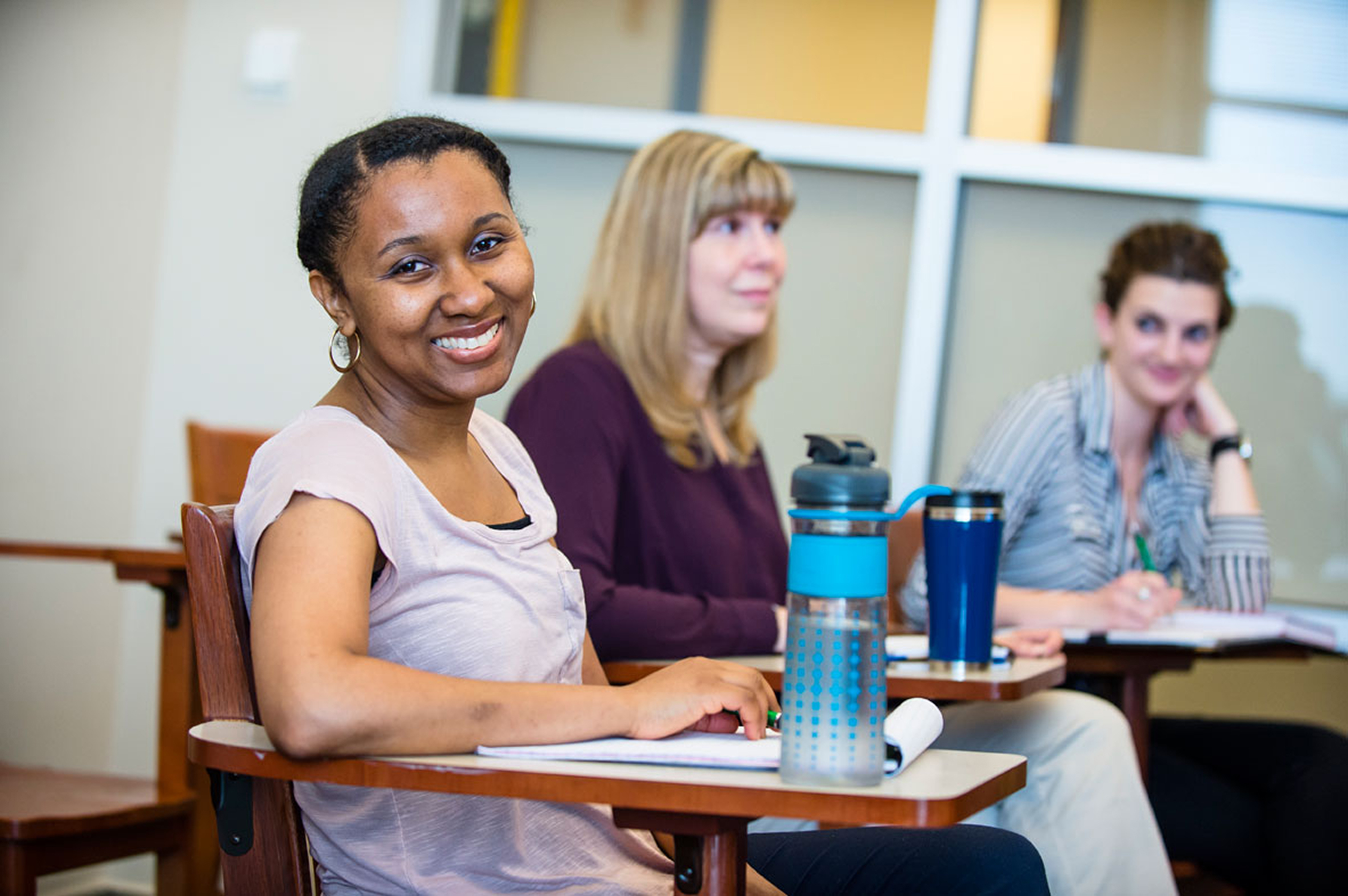 Grad students in classroom.