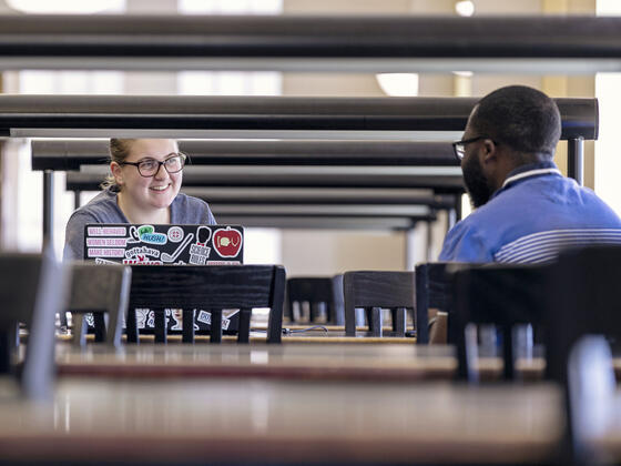 Student in Hoover Library.