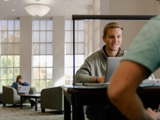 Student in Hoover Library.