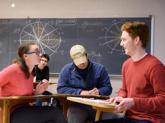 Students sitting at classroom desks during Estimathon.