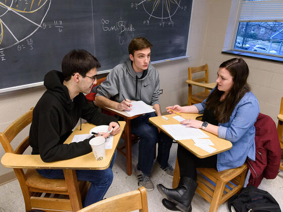 Students sitting at classroom desks during Estimathon.