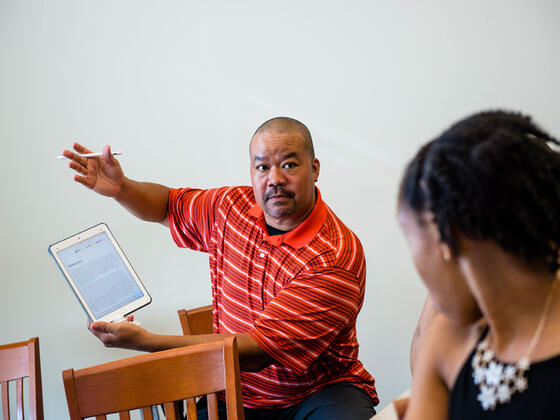 Grad students in classroom.