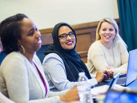 Grad students in classroom.