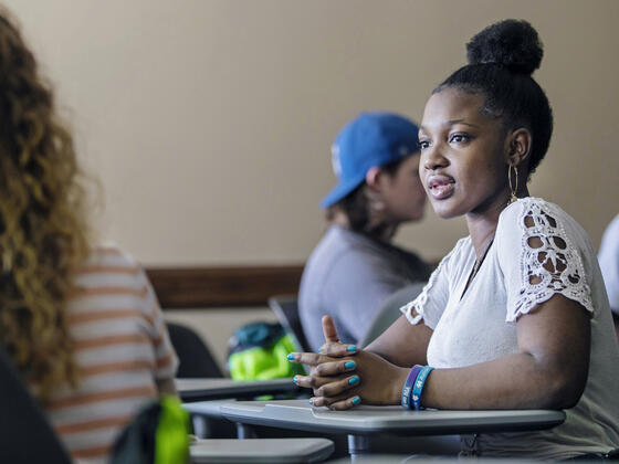 Students seated in classroom.