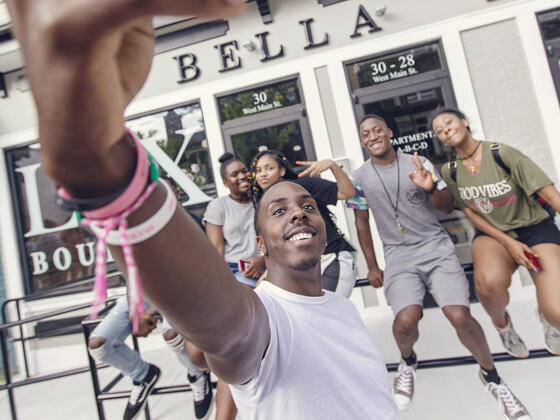 Students taking selfie around downtown Westminster during McDaniel Local.