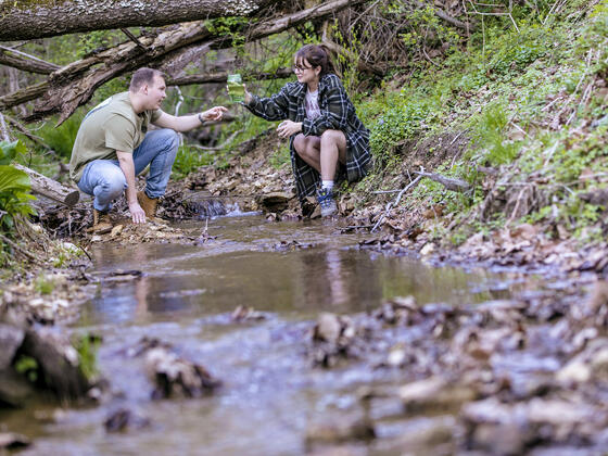 Students taking water samples at Singleton Matthews Farm.