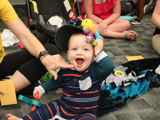 Baby in a classroom full of Developmental Psychology students.