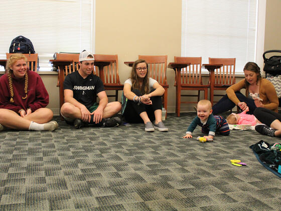 Baby interacting with a classroom full of Developmental Psychology students.