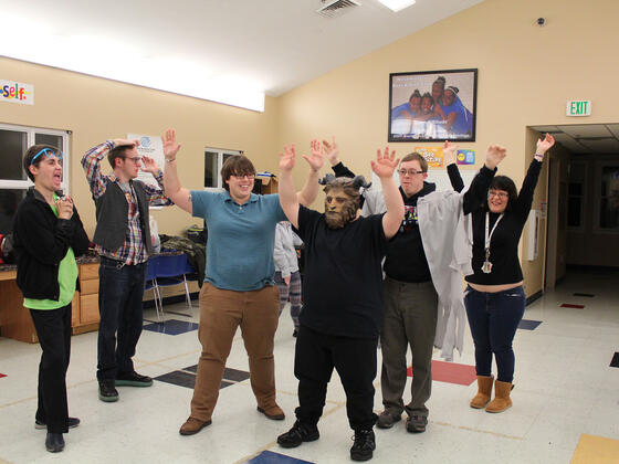 McDaniel alumna Britt Burr '11 (third from left) directs Barrier Free Theatre company members (left to right) Chris Schaeffer, Alex White, (Burr), Gary Boyle, John Nuzzo and Shelley Turner as they prepare for "Dispatch" and "Plant It" on stage in WMC Alumni Hall.