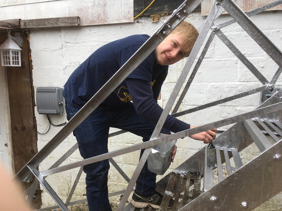 Jeb Shingler, McDaniel College Environmental Studies student, during Spring Break volunteering in West Virginia