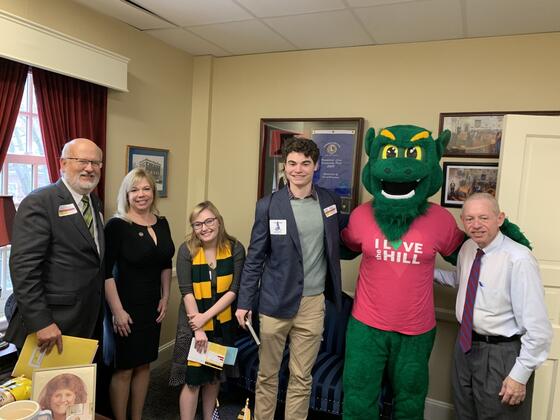 McDaniel College President Roger N. Casey with Maryland State Delegate April Rose, McDaniel students Kasey Reece and Maxwell Pardoe, the Green Terror and Maryland State Delegate Haven Shoemaker Jr.