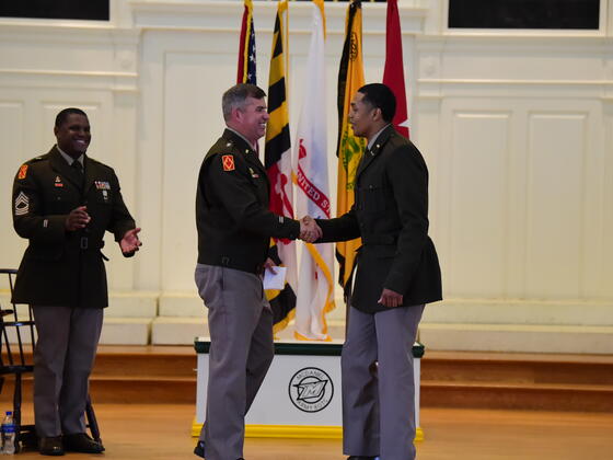 Azagio Herd shakes hands at 2022 ROTC Commissioning. 