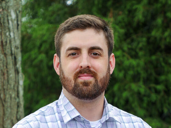 Headshot of Justin Forget.