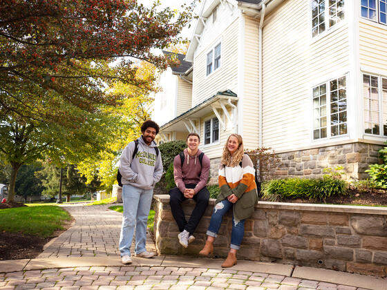 students in front of residence hall
