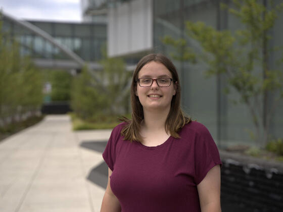 Photo of alum Kaitlyn Bowser standing outside.