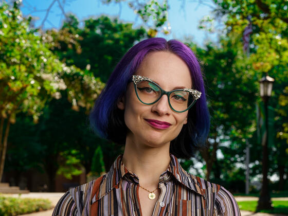 Headshot of professor Virginia Berndt outside.