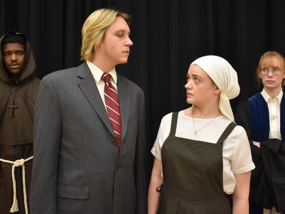 Reese Weaver of Brandywine, Md., as Duke Vincentio, Paul Steinert of Dundalk, Md., as Angelo, Danielle Carter of Rockville, Md., as Isabella, and May Riekenberg of South Orange, N.J., as Escalus, in McDaniel College Theatre’s production of "Measure for Measure."