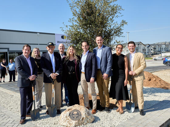 Brett Foelber with his St. John Properties colleagues.