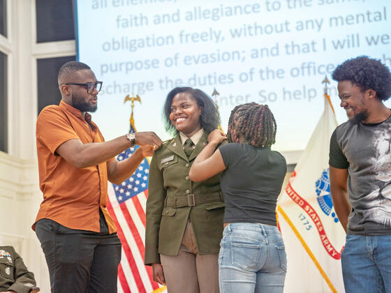 Kekeli Womack gets pinned by her family.