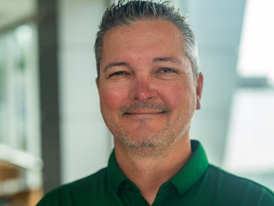 Headshot of James Carone