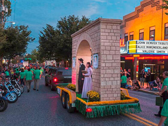 Photo of McDaniel College's float featuring the Arch in Westminster's FallFest Parade