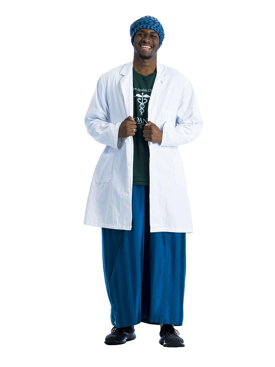 A student in a lab coat on a white background. 