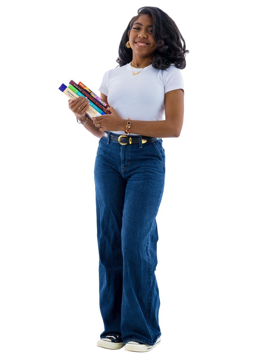 Janiah Field holding textbooks