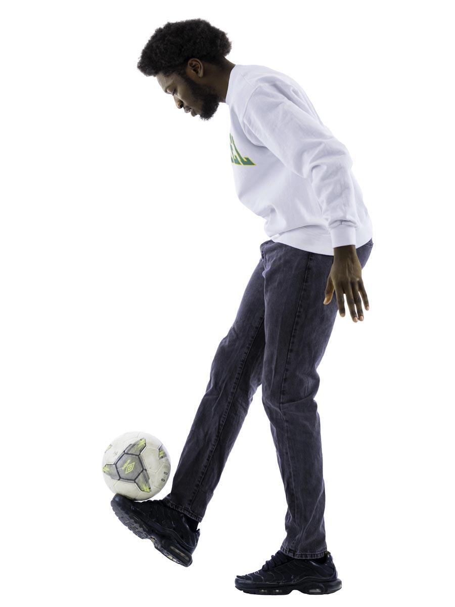 Olanrewaju Oluwaseyi Abayomi kicking a soccer ball