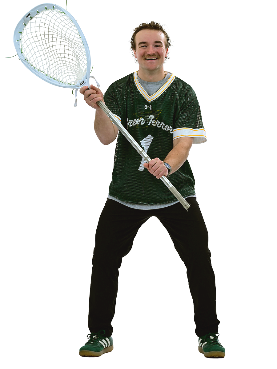 A male student in athletic gear holds a lacrosse stick.