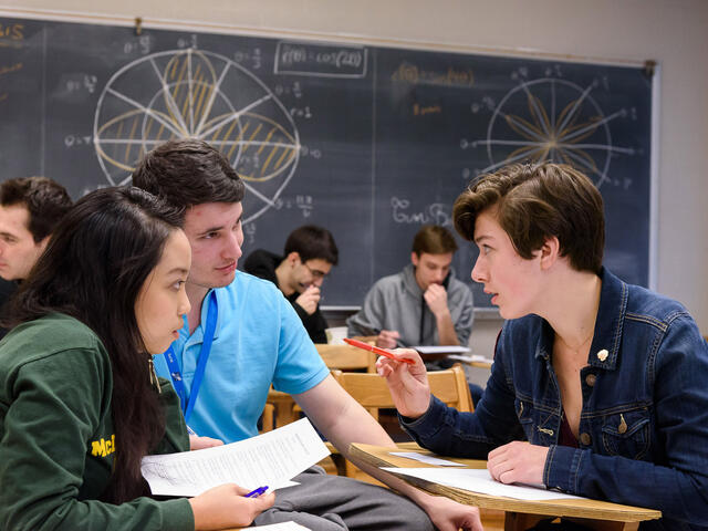 Students sitting at classroom desks during Estimathon.