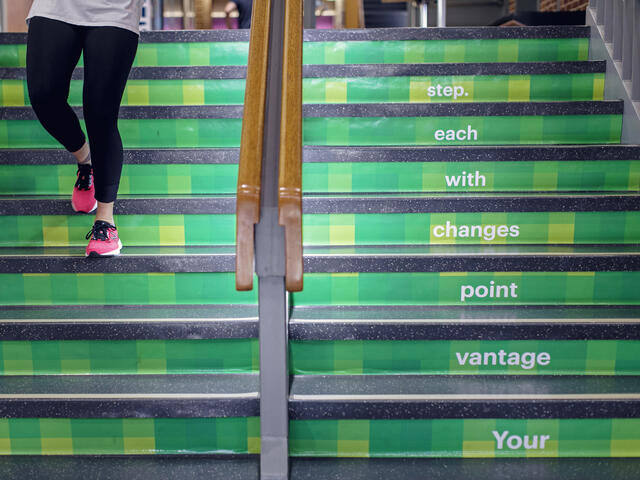 Staircase inside of Decker Center with tartan steps.