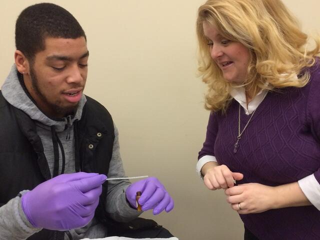 McDaniel student Anthony Crawley (left) tests different essential oils with therapist Shannon Jones in stress management 101