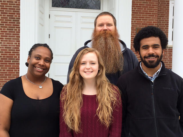 Religious Studies professor Brad Stoddard with students who presented on Religion and Race