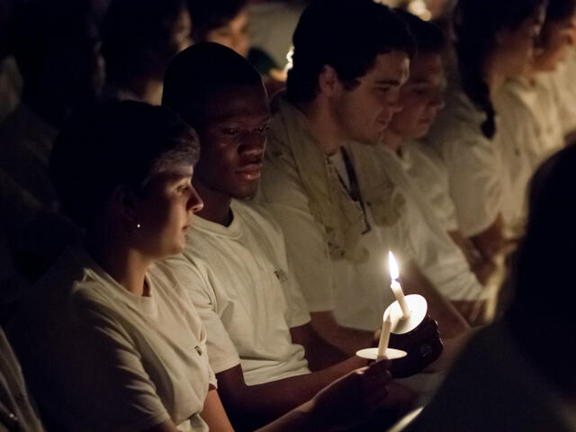 Candlelighting ceremony in Baker Memorial.