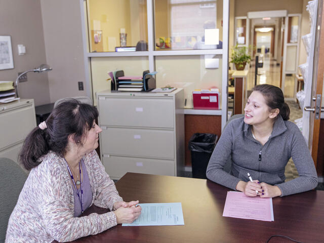 Accommodation specialist with student.