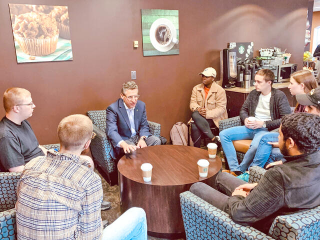 Students from the Writing for Nonprofit Organizations course visit with McDaniel College Board of Trustees member Mark Stuart, president and chief executive officer of The San Diego Foundation.