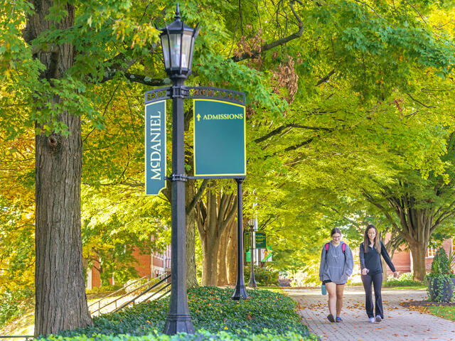 student walking on campus