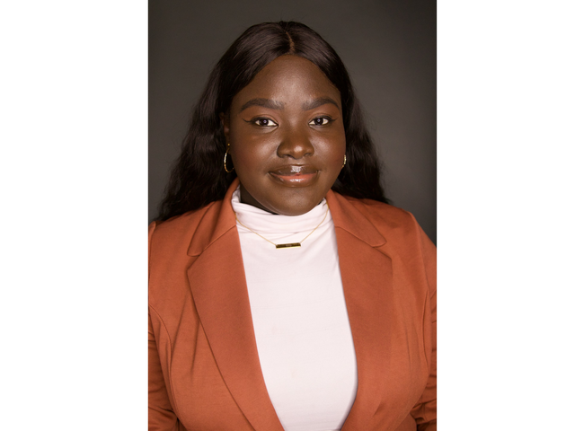 Headshot of alum Yelli Coulibaly.