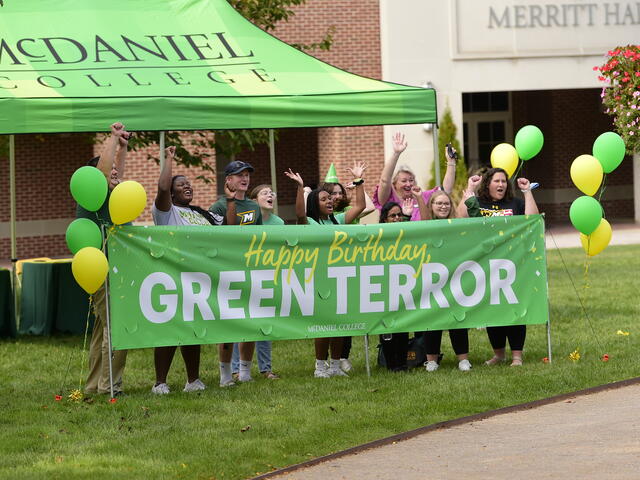 Homecoming 2021 Happy Birthday Green Terror sign with SAC students