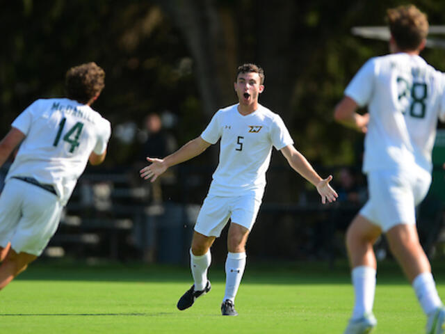 men's soccer player celebrating