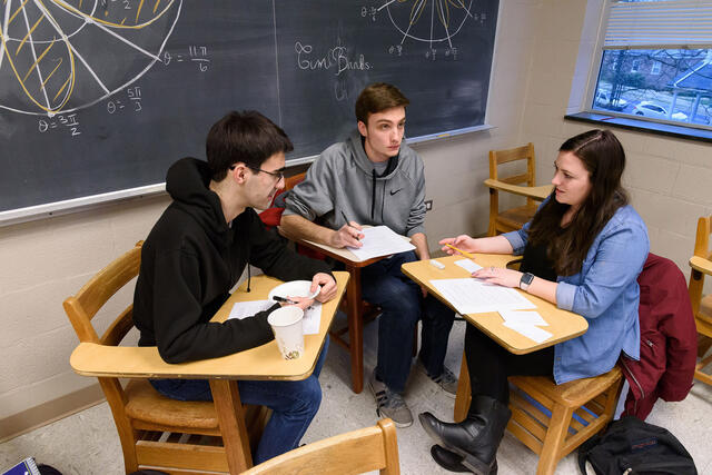 Students sitting at classroom desks during Estimathon.