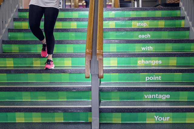 Staircase inside of Decker Center with tartan steps.