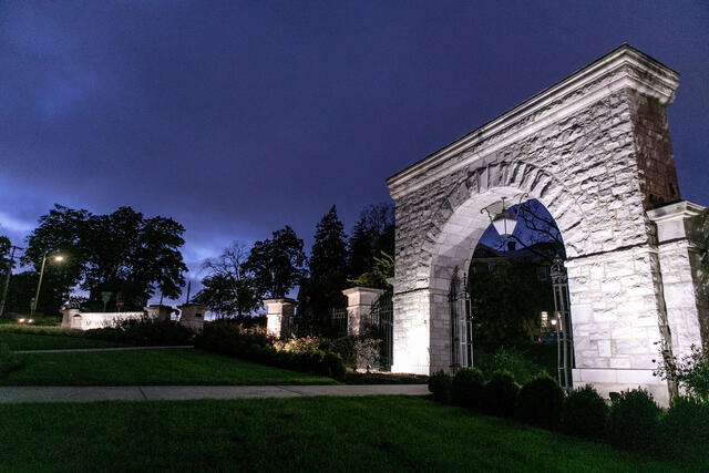 The Arch illuminated in the dark.