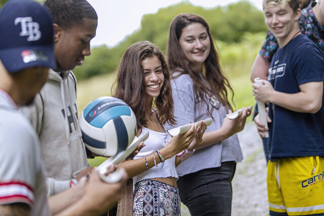 Students participating in team activity at McDaniel Local event.