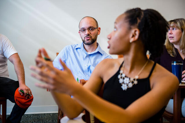 Grad students in classroom.