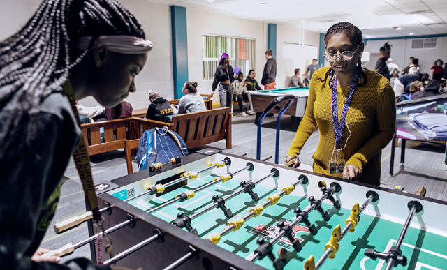 Students in Rec Room on campus.