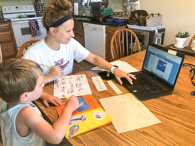 Nicole Selmer, a kindergarten teacher in Carroll County Public Schools (CCPS) at Taneytown Elementary School, works with her student named Samuel during the virtual Reading Clinic.
